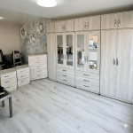 8 door wardrobe with mirror drawers and top boxes